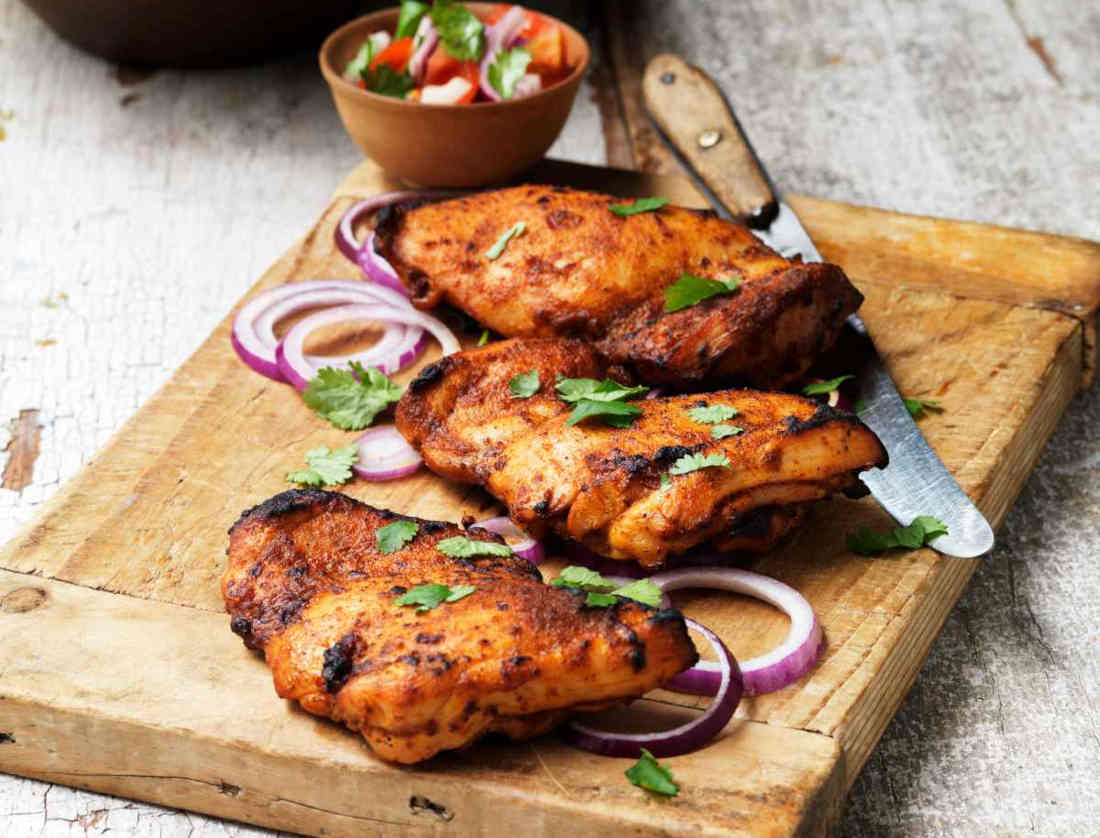 Escalopes de poulet marinées aux épices tandoori