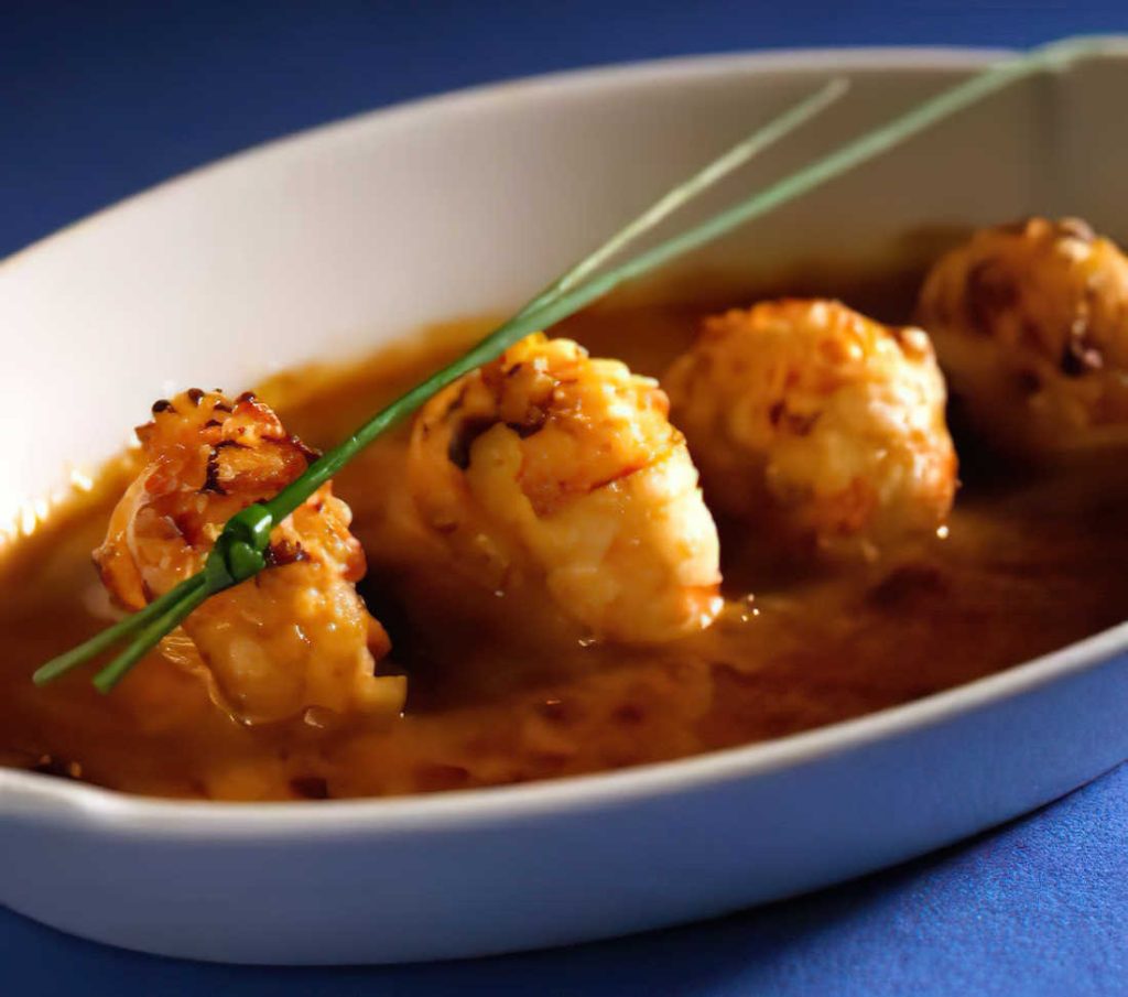 Gratin langoustine sauce armoricaine